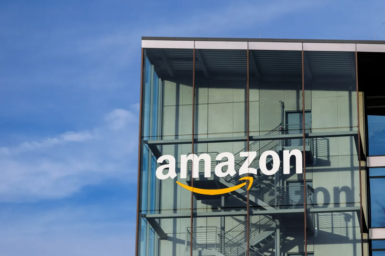 Amazon plans to raise at least $25 billion through a corporate bond sale and says it will not issue additional debt in 2026