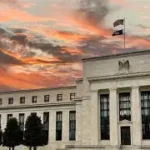 Federal Reserve building at sunset, representing US CD rates, interest rate policy, and fixed deposit market conditions in 2026.