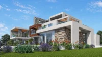 Modern luxury home with large glass windows, outdoor fire feature, and pool area, representing Kenya real estate investment and high-end residential property exposure.