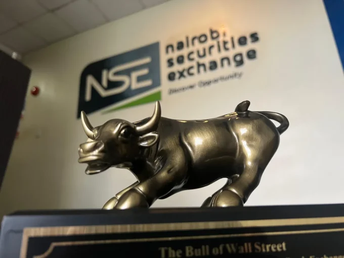 Bull statue displayed in front of the Nairobi Securities Exchange logo, representing the Kenya stock market rally and investor confidence in 2026.