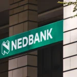 Nedbank signage on a building, representing Nedbank corporate bonds, South African bank funding and floating-rate note issuance.