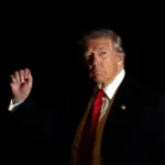 The United States economy remains resilient under President Trump as progress on key economic promises slows, highlighting growth, employment, fiscal policy, trade, and investor sentiment
