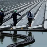 Article image showing a large solar-panel farm in Japan with Mount Fuji in the background. The image represents renewable energy investment, Japan’s climate transition financing programme and the use of bond proceeds for clean-energy and decarbonisation projects.