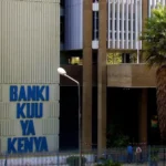 Exterior view of the Central Bank of Kenya building with the words “Banki Kuu ya Kenya” visible on the wall, used to illustrate Kenya Treasury bond issuance, government securities, bond switches and CBK auction activity.