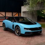 Ferrari's first electric vehicle sells for a record $40 million at auction, highlighting strong demand for high-performance electric cars and Ferrari's entry into the EV market.