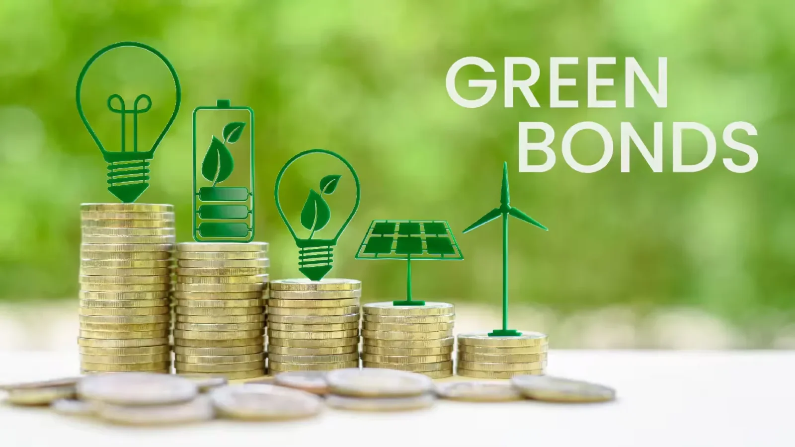 Green bond concept image showing stacks of coins with renewable energy icons, including a light bulb, battery, solar panel and wind turbine, used to illustrate sustainable finance, green bonds and environmental project funding.