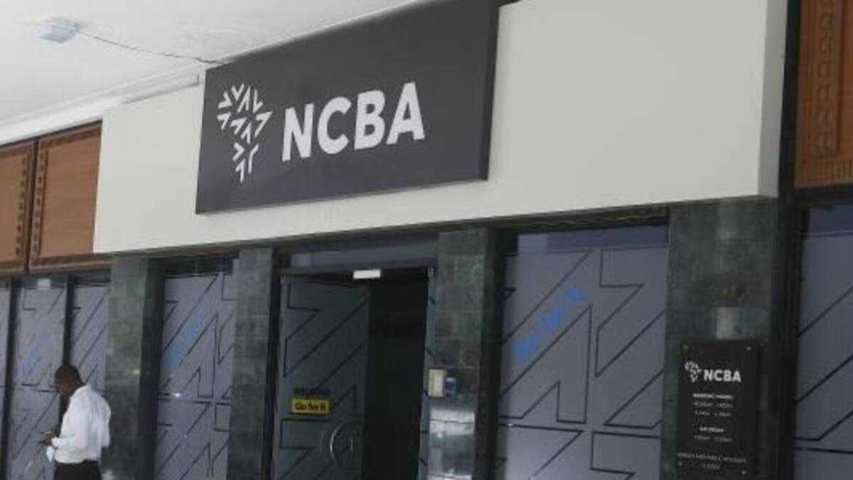 Exterior image of an NCBA branch entrance with the NCBA logo displayed above the doorway, representing the Kenyan banking group’s financial results, dividend announcement and investor outlook.