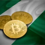Image of gold crypto coins placed on a Nigerian flag, representing Nigeria’s digital-asset market, stablecoin regulation, crypto payments and central-bank supervision.