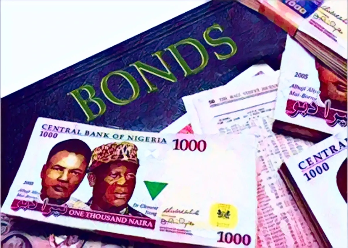 Article image showing Nigerian naira notes placed next to a bond document. The image represents Nigeria’s Federal Government bond market, naira-denominated debt, sovereign borrowing and fixed-income investment.