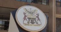 Uganda holds its benchmark interest rate at 9.75% as oil-driven inflation remains contained, balancing price stability, economic growth, energy costs, and monetary policy