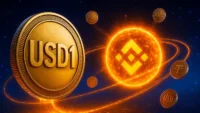 Digital illustration of a large gold coin labelled USD1 floating in a space-like crypto environment with several smaller digital-asset coins around it. A bright glowing crypto symbol appears in the background, creating a futuristic stablecoin and digital-finance theme. The image is used to illustrate USD1’s move toward a federally supervised trust-bank structure and the broader competition among stablecoins for trust, liquidity and institutional adoption.