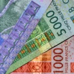 Senegal bonds hit record lows as debt risks deepen, highlighting sovereign debt, bond yields, investor confidence, and financial market pressure