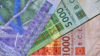 Senegal bonds hit record lows as debt risks deepen, highlighting sovereign debt, bond yields, investor confidence, and financial market pressure