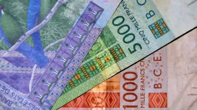 Senegal bonds hit record lows as debt risks deepen, highlighting sovereign debt, bond yields, investor confidence, and financial market pressure