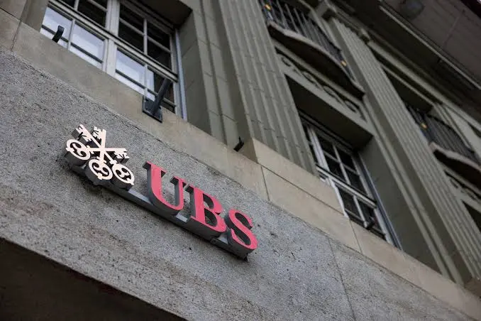 UBS sees two Fed rate hikes in 2026 after a jobs surge, highlighting U.S. interest rates, Federal Reserve policy, employment data, inflation, and financial markets